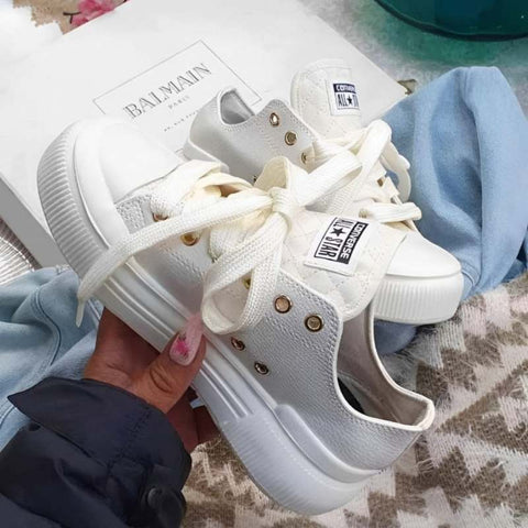 Converse corte bajo en tendencia